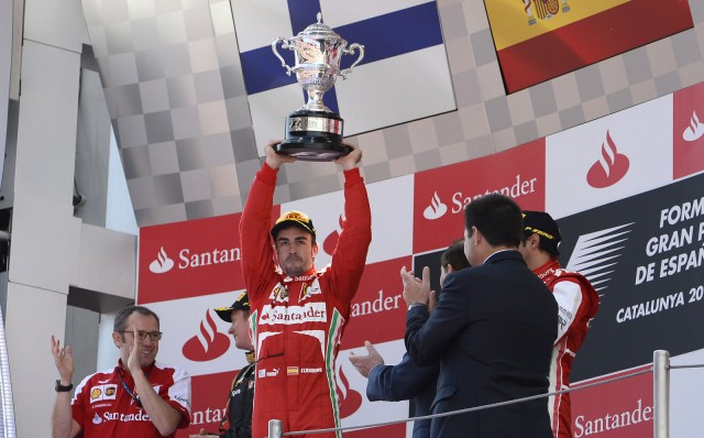 ferraris-fernando-alonso-after-winning-the-2013-formula-1-spanish-grand-prix_100427052_m